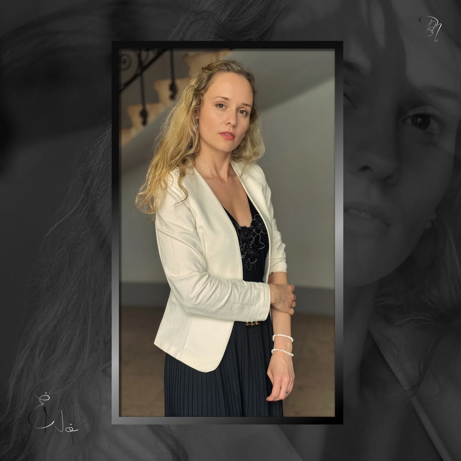 White blazer — Photo: Norbert Banhalmi A woman in a white blazer stands indoors and looks into the lens.